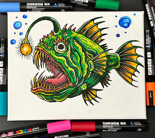 Colorful illustration of a fish with open mouth on a white background, surrounded by markers.