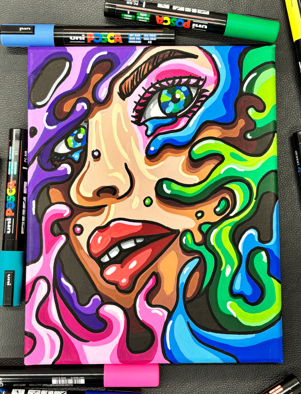 colorful abstract drawing of a female face